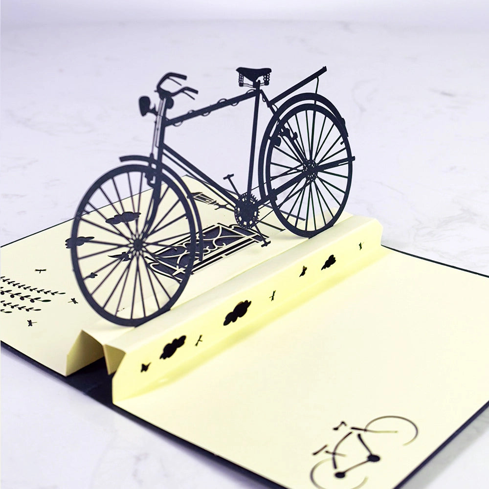 Detailed 3D bicycle pop-up greeting card from side angle